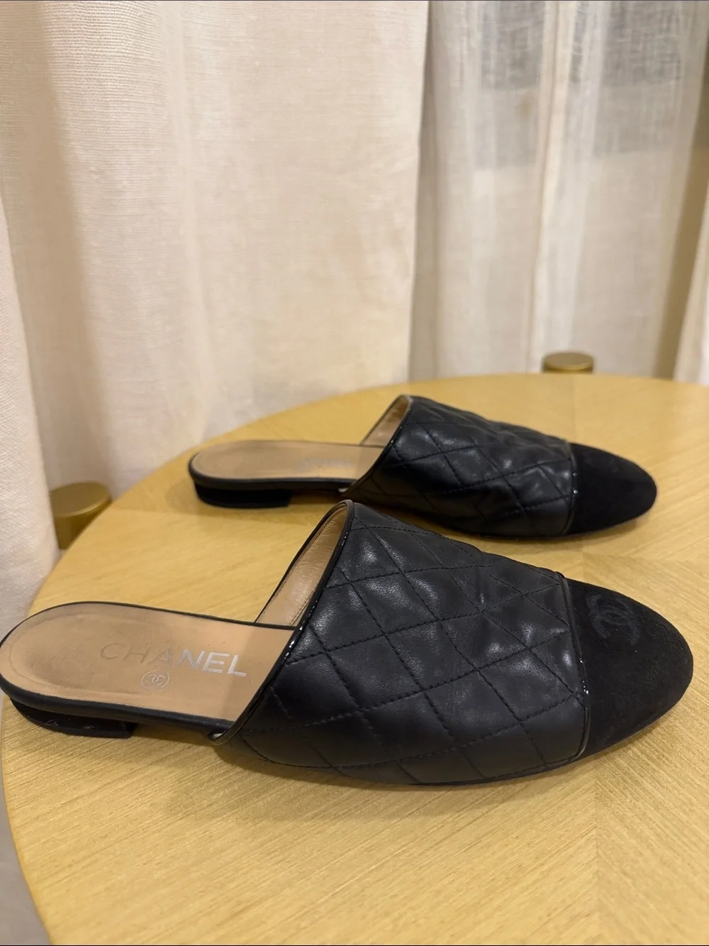 CHANEL Black Quilted Leather Slide Mules